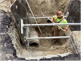 Pictured above: Crews work to upgrade underground utilities along 36th Ave W.