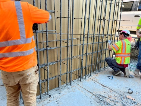 Crews create the form to pour a retaining wall for the southbound Swift station along 36th Ave West.