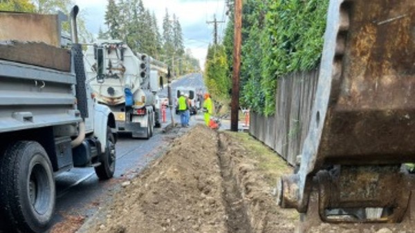 Crews create the form to pour a retaining wall for the southbound Swift station along 36th Ave West.