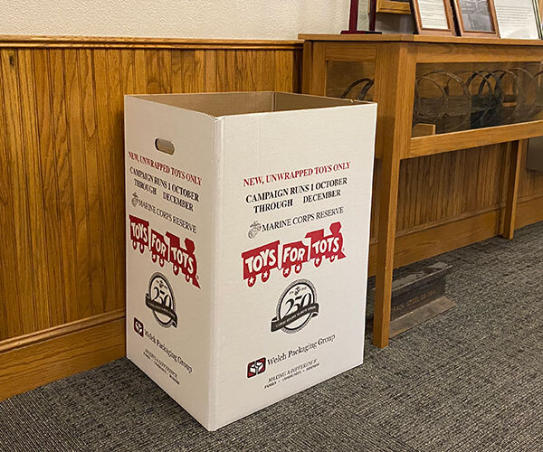 Cardboard Toys for Tots box in the lobby of Walla Walla City Hall