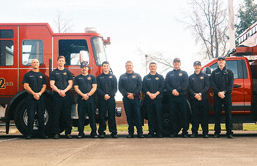 Nine Walla Walla Fire Department personnel with two fire vehicles