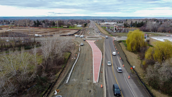 Myra Road South Extension Project, arial facing west of the project site and roundabout construction. 