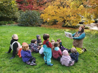 Children get story time outdoors