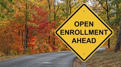 Road sign with Open Enrollment
