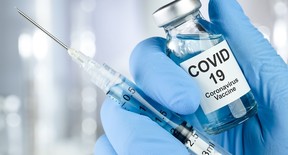 COVID-19 vaccine vile and needle