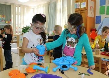 two children building 