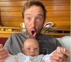 Dad holding his baby 