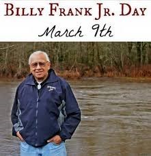 Photo of Billy Frank Jr. standing in front of the calm waters of the Nisqually River. Text above the photos says, "Billy Frank Jr. Day March 9th"