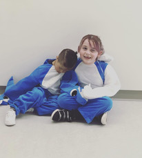 boy leaning on a girl's shoulder 