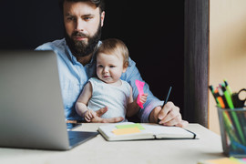 parent studying with young child