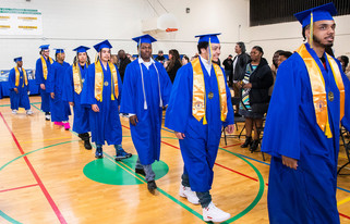 GHS youth walking the graduation aisle