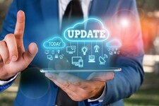 Man holding tablet with digital bubble above showing images of revisions