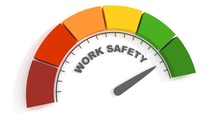 Color scale of work safety from red to green, arrow pointing to green