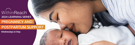 Close up of a mother, in profile, leaning down to kiss her infant baby.