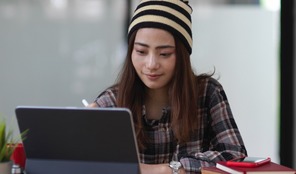 girl working at a laptop for training