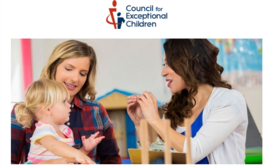 photo a therapist signing to a little girl that is sitting on her mom's lap