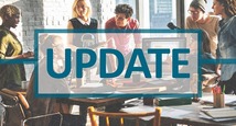 Picture of co-workers collaborating around conference table, Text overlay, "Update"