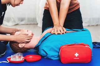 CPR Training ,Emergency and first aid class on cpr doll