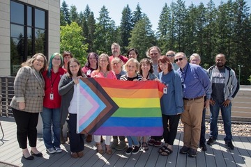 DCYF staff with pride flag