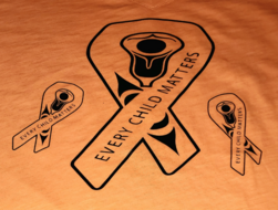 Orange t-shirt with 3 black ribbon designs featuring Indigenous art. The text "Every Child Matters" printed on each ribbon.