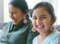 mom and child smiling