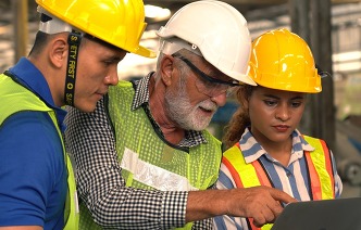 Team Of Engineers Having Discussion