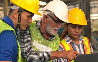 Team Of Engineers Having Discussion