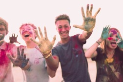 teens outside covered in paint