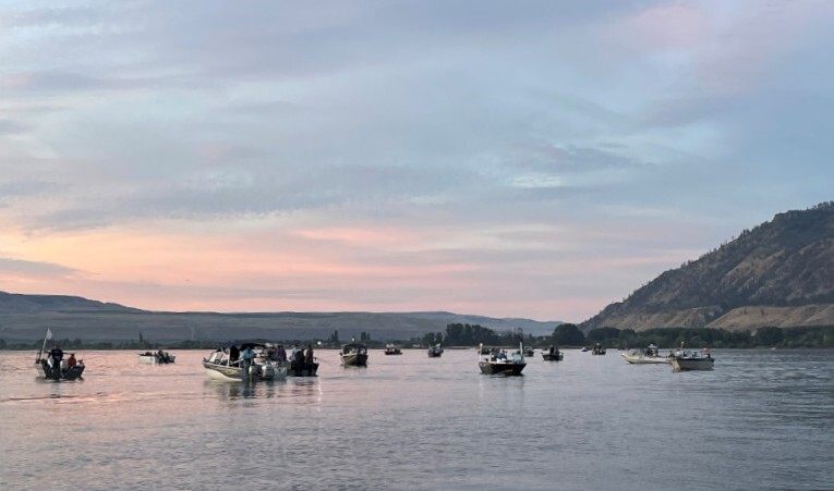 Boats congregate at Brewster Pool on the Upper Columbia River to try their luck at catching sockeye salmon.