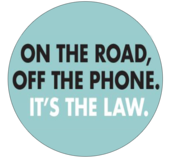 Image with wording "on the road, off the phone. It's the law."