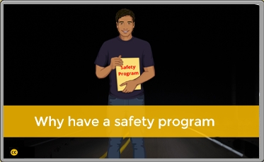 Image of character holding a safety program book