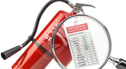 Close-up of a fire extinguisher's monthly inspection check list