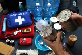 These items should include a first aid kit,food,water,flashlight,radio,sleeping bag.Items that will help you.