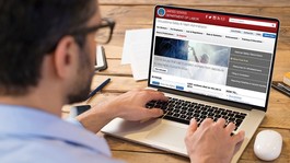 Screen capture of Man reading OSHA webpage