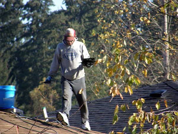 Patrick Dean Farthing walks on roof in November 2018.