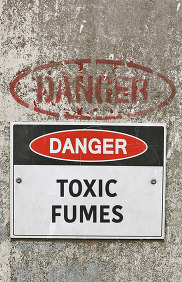 toxic fumes danger sign on wall