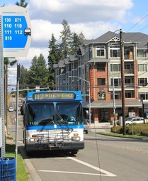 Transit oriented development image with bus