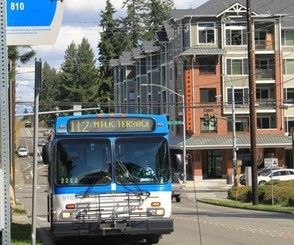 Bus stopping for passengers in an urban setting