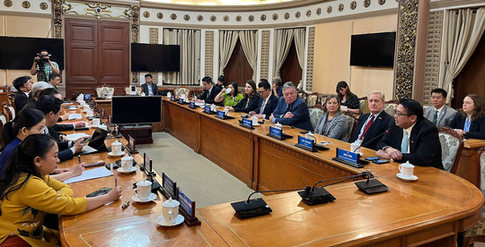 Commerce Director Mike Fong speaks during a roundtable. 