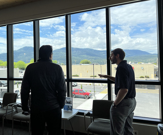 Director Fong views the NEW Health picture windows