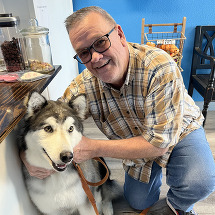 Phil Tracy with his husky, Luke