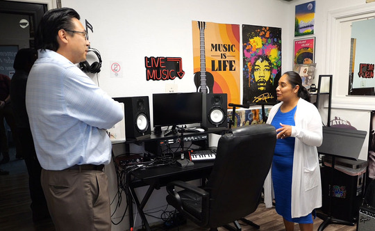 Director Fong tours the Triumph Teen Life Center.