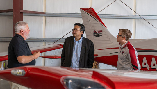 Fong views some of CWU's airplane fleet.