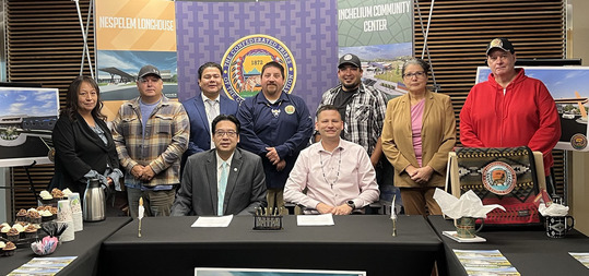 Commerce Director Mike Fong and Confederated Tribes of the Colville Reservation Chairman Jarred-Michael Erickson with other tribal represnetatives.