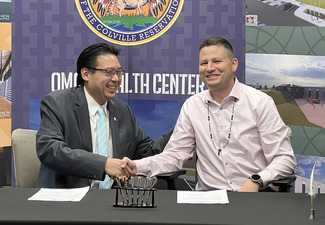 From left: Director Fong and Chairman Erickson.