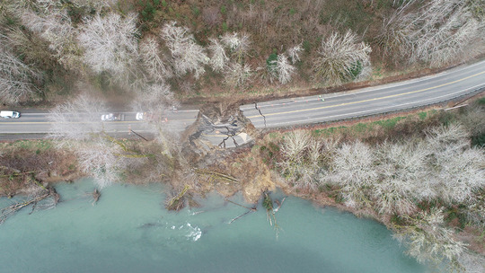 Damaged pavement collapses into the Satsop River in Grays Harbor County.