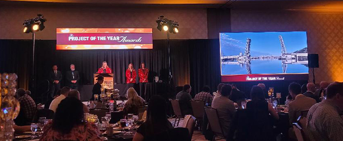 City of Tacoma staff accepting the project of the year award at a dinner.