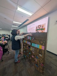 Ann Campbell and David Brocious work on a sculpture