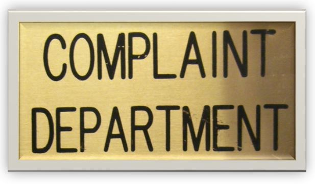 Complaint Department wall directional sign