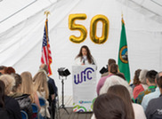 Washington State WIC director Brittany Tybo addresses the crowd during the 50th Anniversary celebration